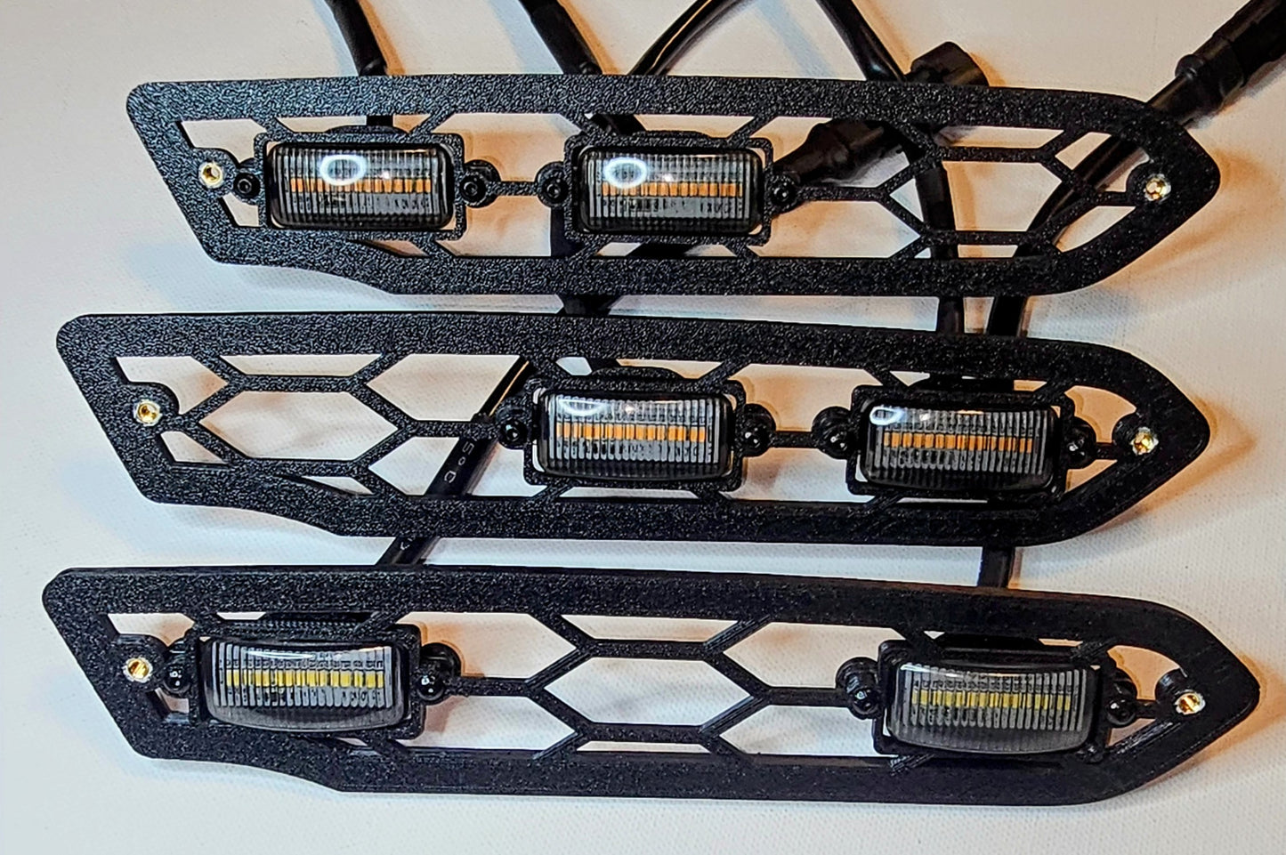 T7.2: 2023-25 Subaru Outback Non-Wilderness Trim DRL/Grille lights